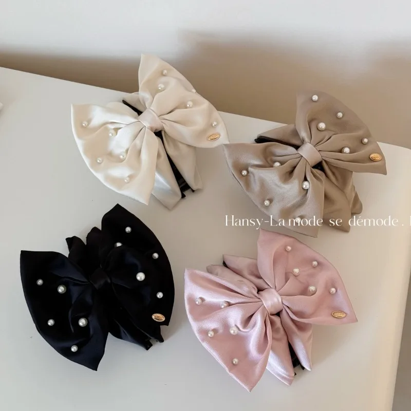 

Three-dimensional pearl bow triangular hairpin new grab clip top clip hairpin disc hair shark clip hair accessories new