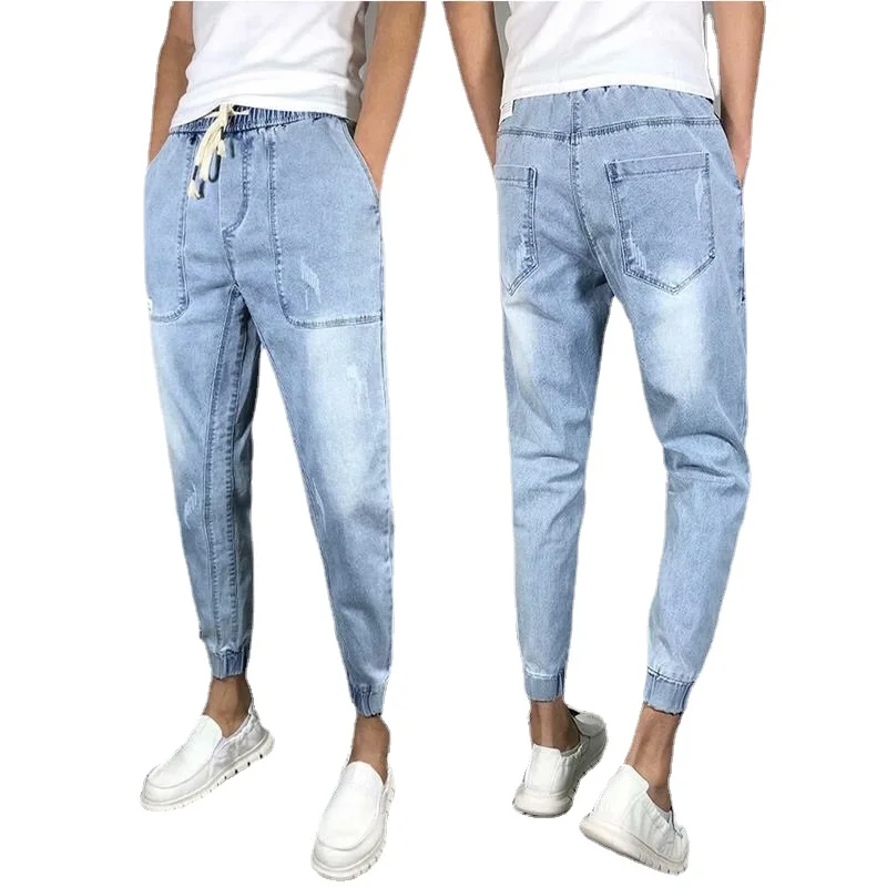 

Wholesale 2022 Fashion Male Students Loose Harem Pants Social Spirit Baggy Drawstring Small Feet Kpop Cowboy Jeans Trousers