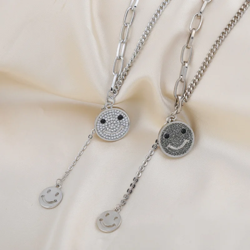A brand-new multi-purpose autumn and winter smiling face necklace with a classic tassel mid-chain collarbone chain for women