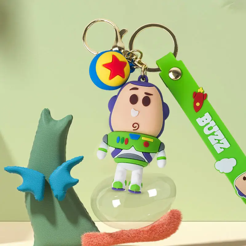 

Ugly cute Toy Story Buzz Lightyear Woody PVC keychain Disney Qversion Doll Boy and girl couple bag zipper decoration pendant toy