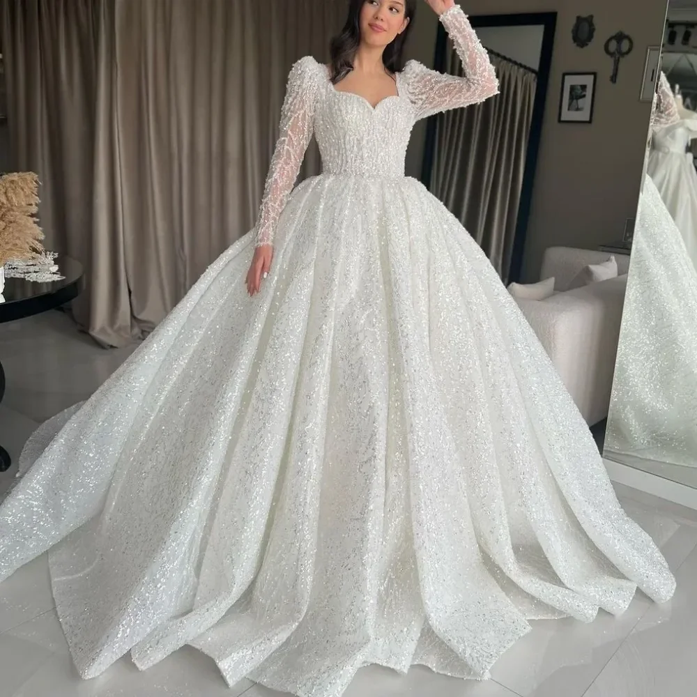 Abito da Sposa Personalizzato di Lusso Scintillante a Linea A, Maniche Lunghe, Ricamo in Pizzo e Perline, Scollo a V, Volant, Abito da Sposa Vaporoso