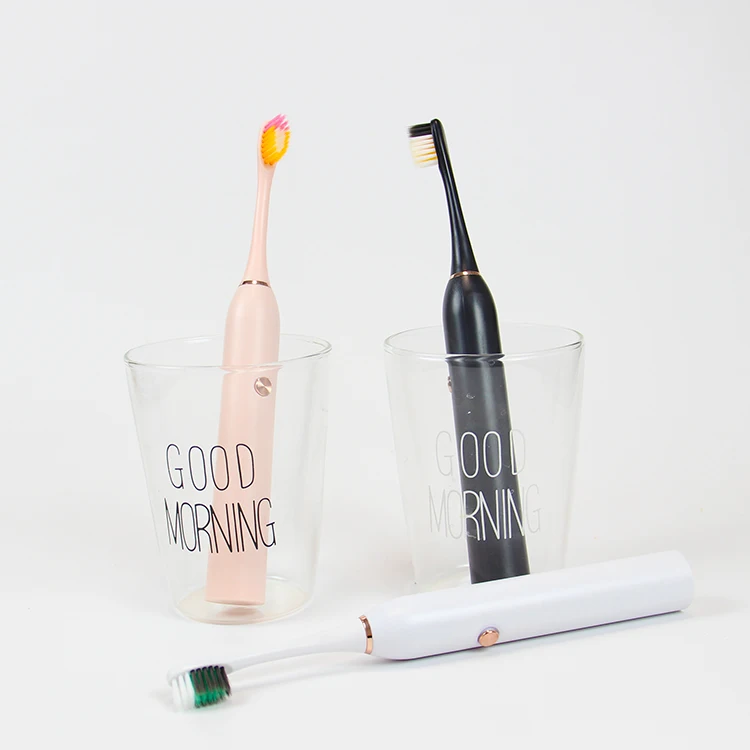 Precio al por mayor barato Uso doméstico Cepillo de dientes eléctrico inteligente sónico para adultos con batería y cabezal de cepillo