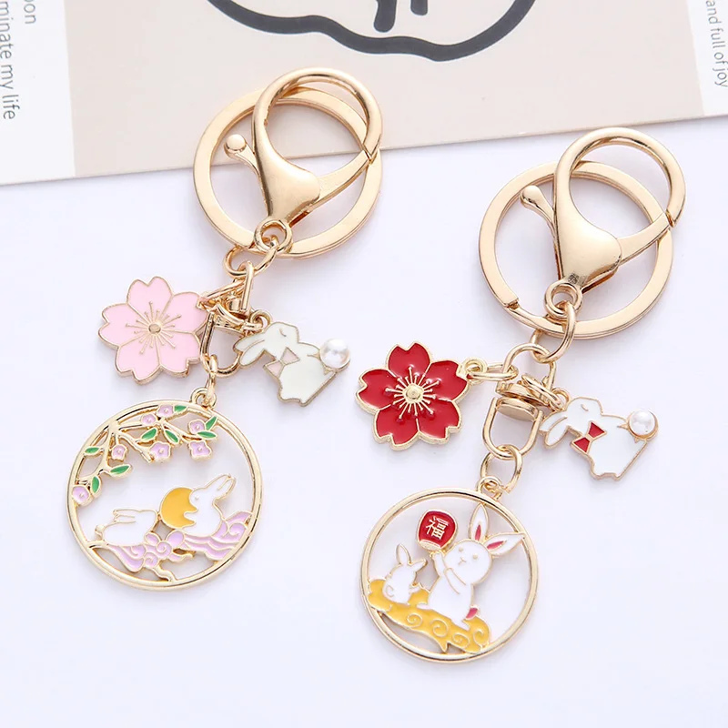 Liontin Anjing Cinta Bintang Busur Cantik Gantungan Kunci Pasangan Tas Mobil Gantungan Kunci Jimat Bulan Kelinci Bunga Sakura Lucu Perhiasan Baru untuk Wanita