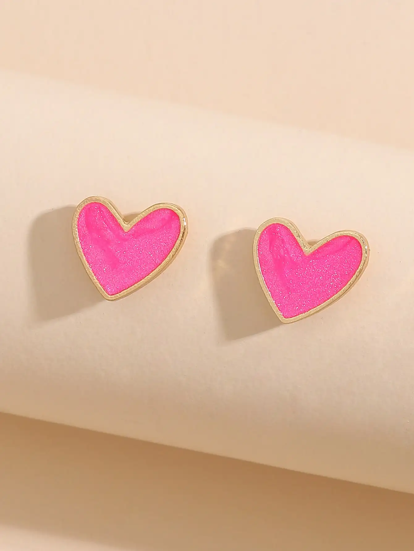 

Pink Glitter Heart Stud Earrings with Gold Tone Border