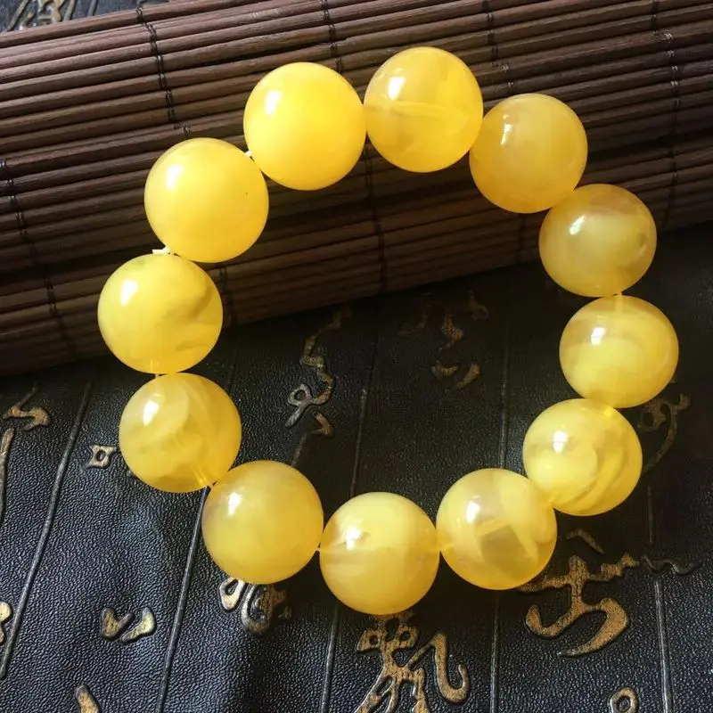 Imitation second-generation golden amber with chicken oil yellow and floating patterns, single-strand bracelet, fluorescent, flo
