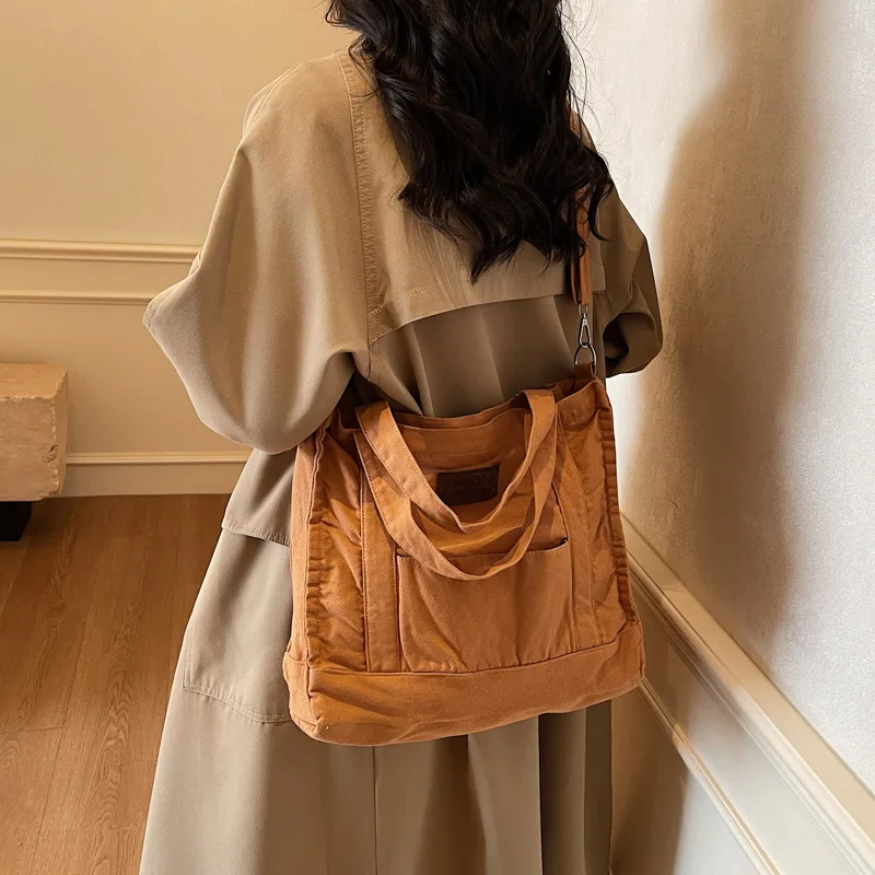 

Women's commuter lightweight tote bag with large capacity - perfect for students carrying their books on their shoulders.