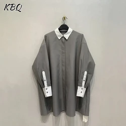 KBQ Hit Color Spliced Button Minimalist Loose Coats For Women Lapel Long Sleeve Vintage Casual Coat Female Fashion Winter New