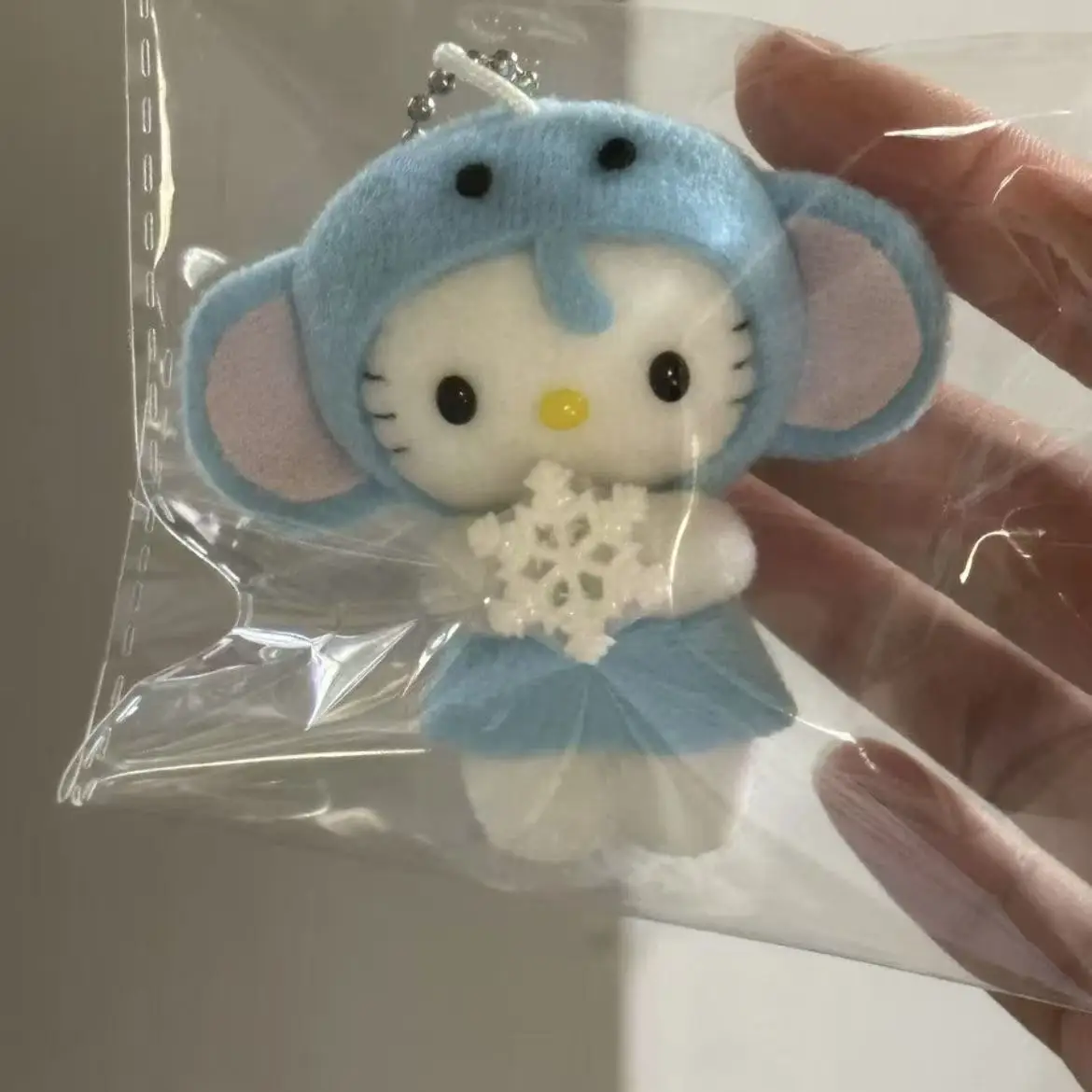 Kawaii Hello Kitty Cosplay elefante dibujos animados muñeco de peluche llavero Anime Sanrio corazón femenino Linda mochila colgante de felpa regalos para niñas