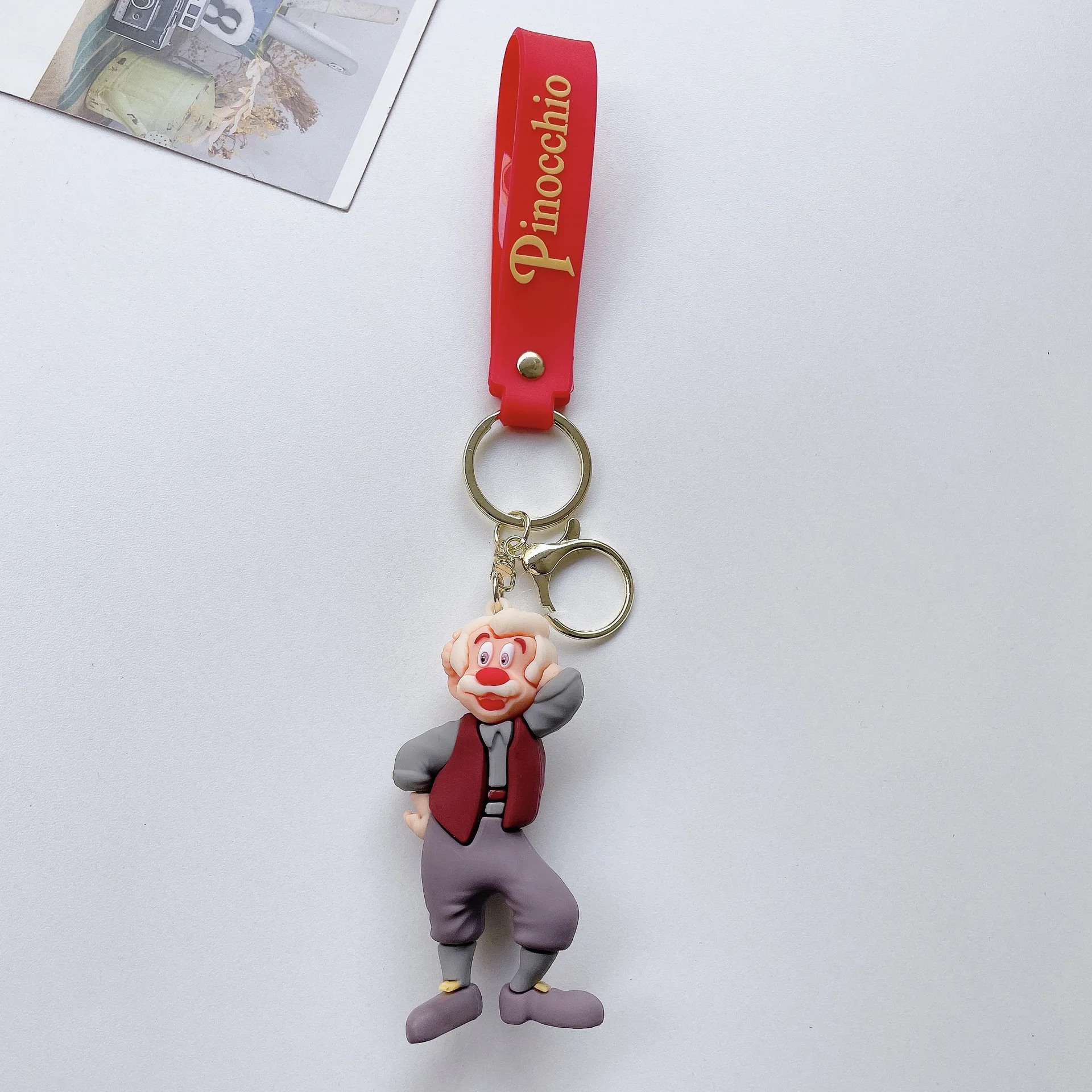 Creative cartoon new Cartoon Pinocchio Key chain creative old carpenter lying long nose boy key bag pendant