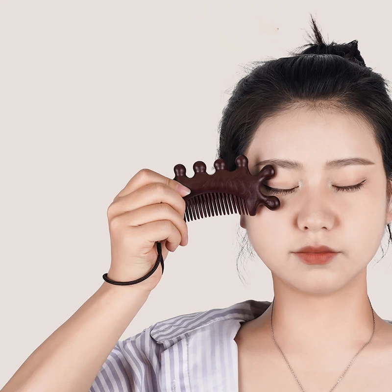 

Experience Effective Hair Treatment with 2pcs Sandalwood Whale Combs for Scalp Massage.