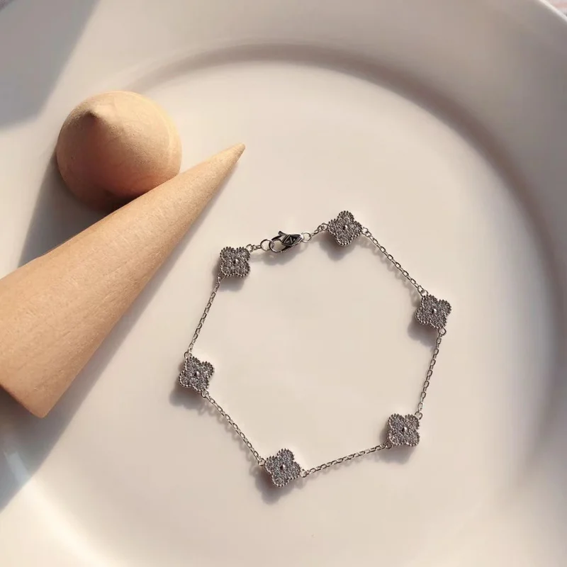 

Браслет из стерлингового серебра S925 с пятилистным клевером, женский, с белыми цирконами, полностью инкрустированный, универсальный, роскошный, модный ювелирный аксессуар