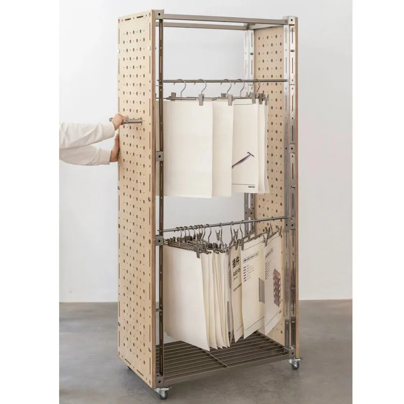 Commercial hanger, floor-to-ceiling clothes rack overnight