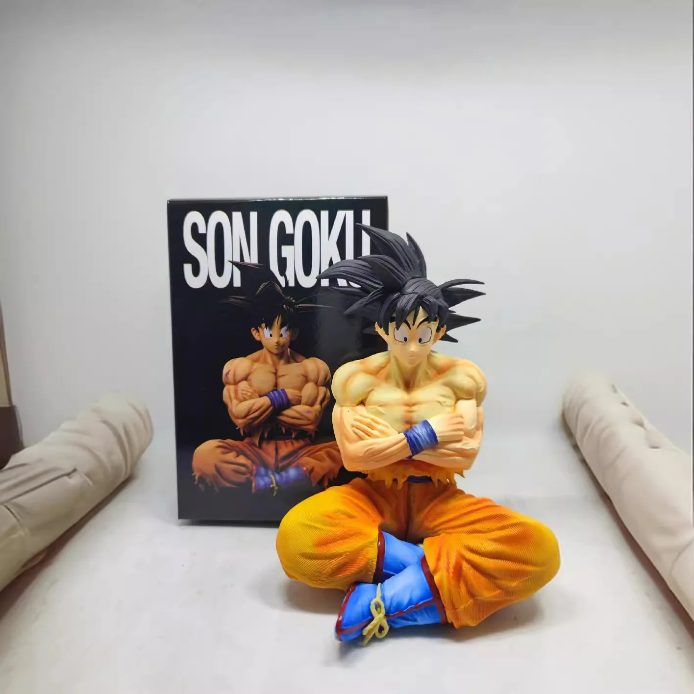 Figurines Dragon Ball Son Goku, 15cm, Figurine d'action assise, modèle en Pvc, Collection de statues, jouets de décoration, poupée d'ornements cadeaux