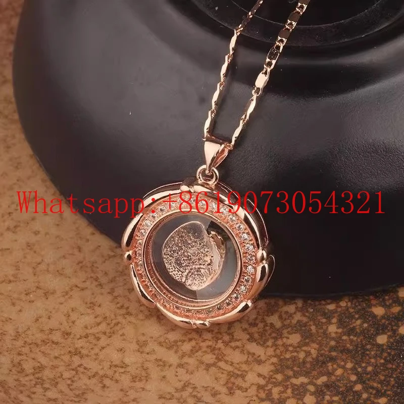 

Ожерелье, вращающийся кулон с инкрустацией розовым золотом