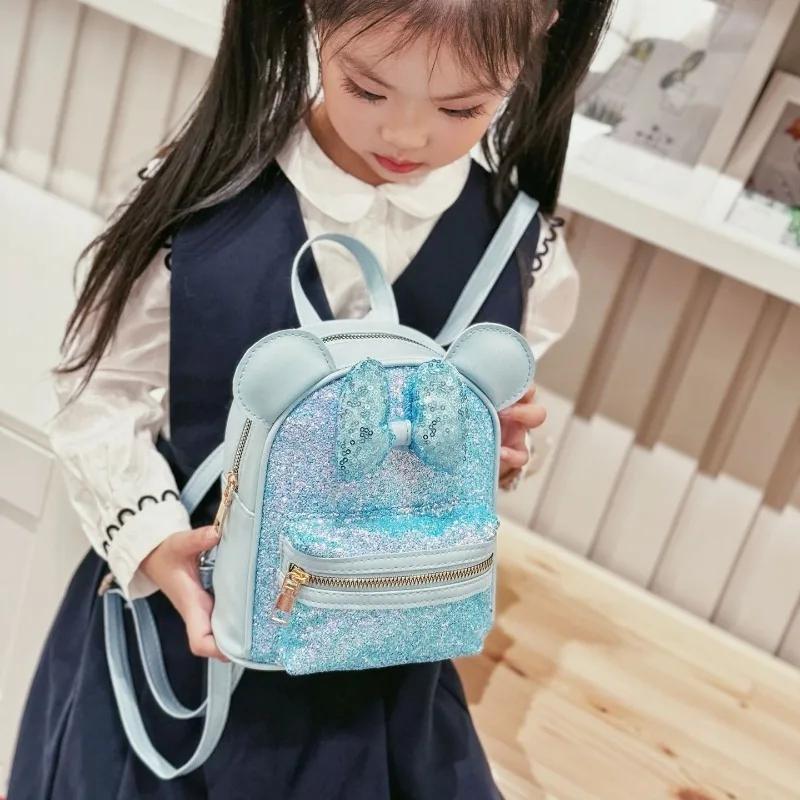 حقيبة ظهر ديزني ميني ماوس للفتيات بفيونكة صغيرة متألقة كرتونية لطيفة على الموضة هدية عيد ميلاد للمدرسة لرياض الأطفال