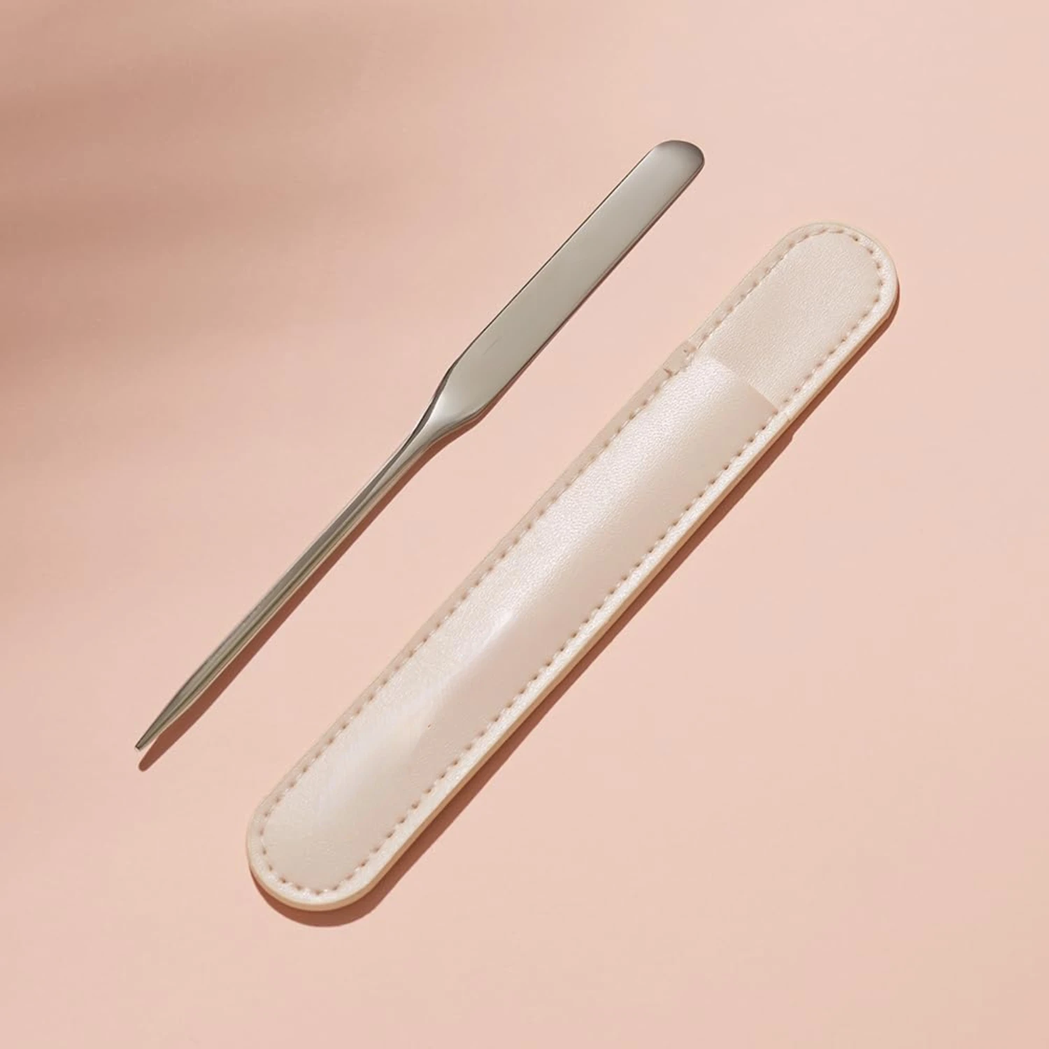 قم برفع روتينك باستخدام ملعقة مستحضرات التجميل المصنوعة من الفولاذ المقاوم للصدأ عالية الكفاءة لتحقيق نتائج المكياج الخالية من العيوب. صنع الذكاء #4