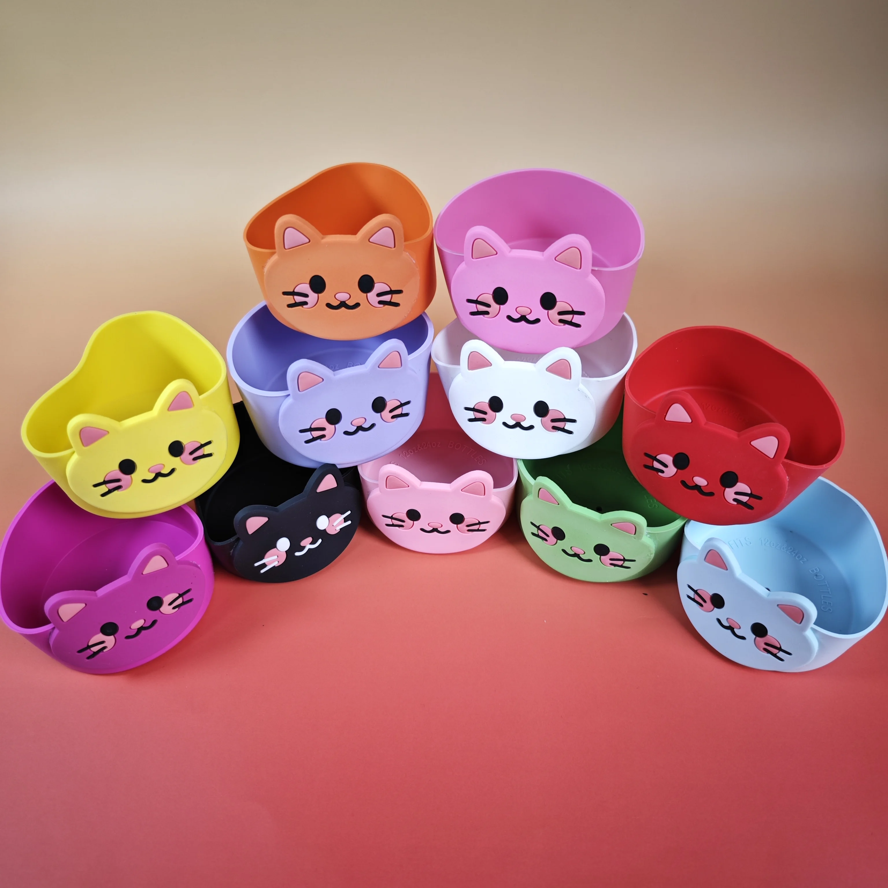 Hot-selling cartoon silicone cup sleeves, soft rubber, cute little cat design, heat-resistant and insulating for for for for Tum