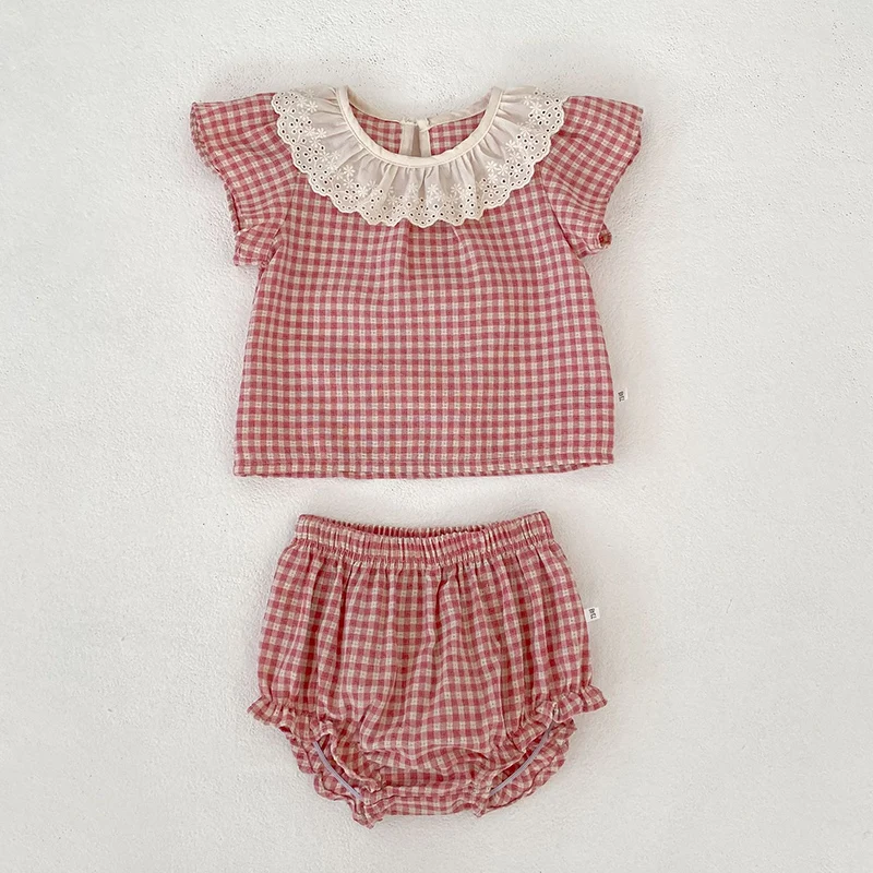 

Новый летний комплект детской одежды для девочек 2026: рубашка с рукавами-крылышками из хлопка в клетку + шорты (0-4 года)