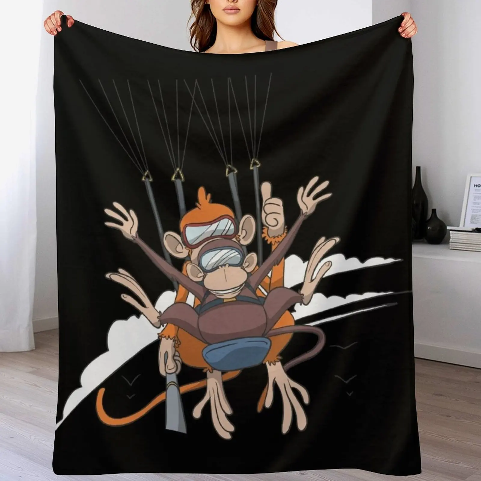 Monkeys in paragliding tandem flight Throw Blanket Decorative Throw Flannel Fabric Luxury Blankets