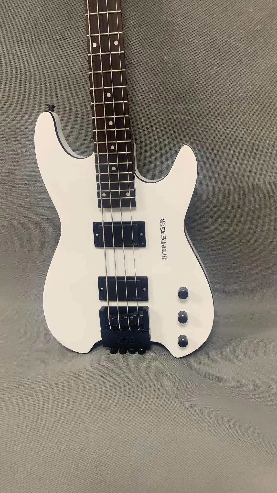 top-grade 4-string headless bass electric guitar, white body, black neck, high-end headless bridge, free shipping