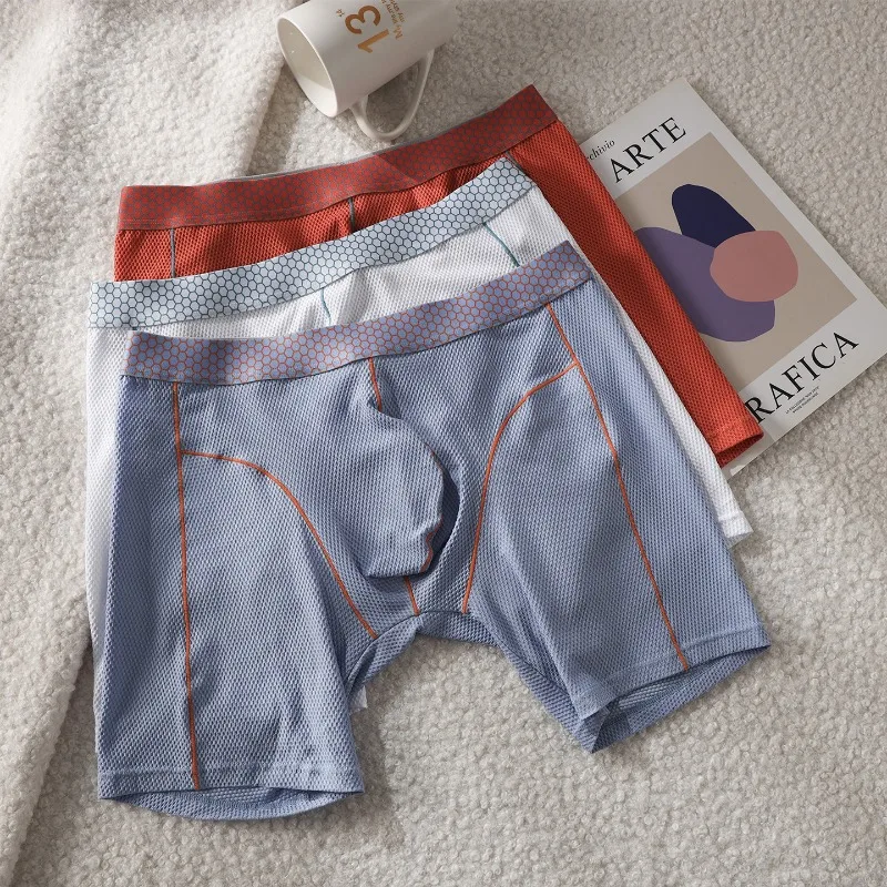 

Solid color fashion men's underwear sports fitness three-point pants solid color pants mid-waist boxers NK46