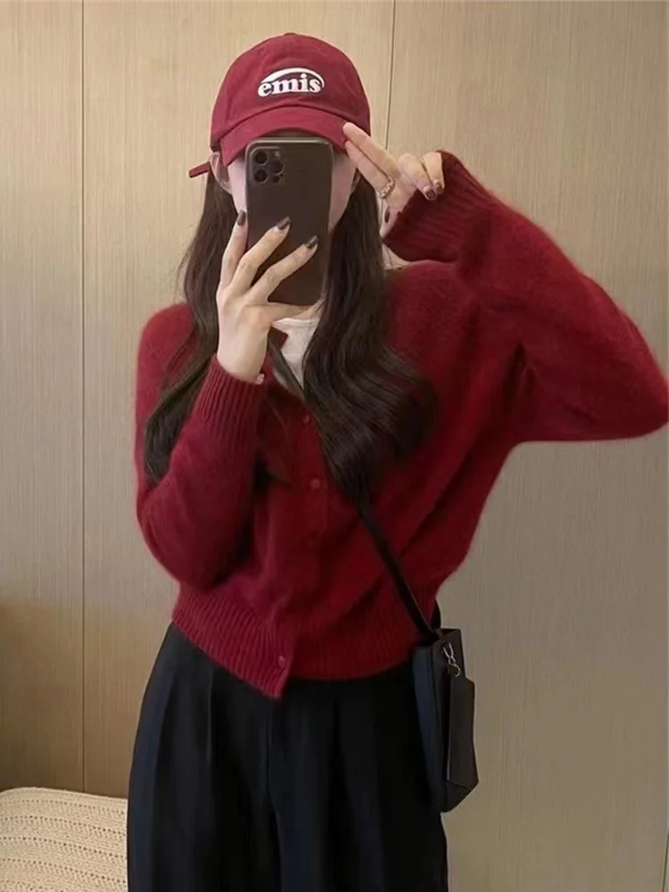 

Autumn and winter ladies cashmere cardigan sweater coat round neck loose knit thick sweater Joker age-reducing pure cashmere.