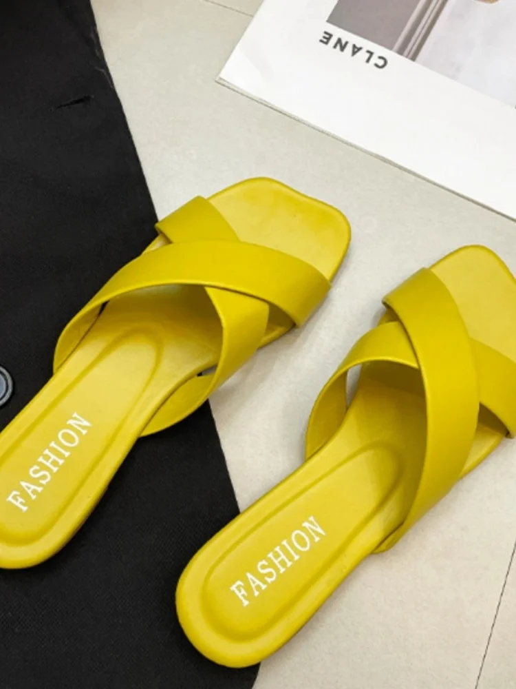 

Candy colored square headed flat bottomed slippers