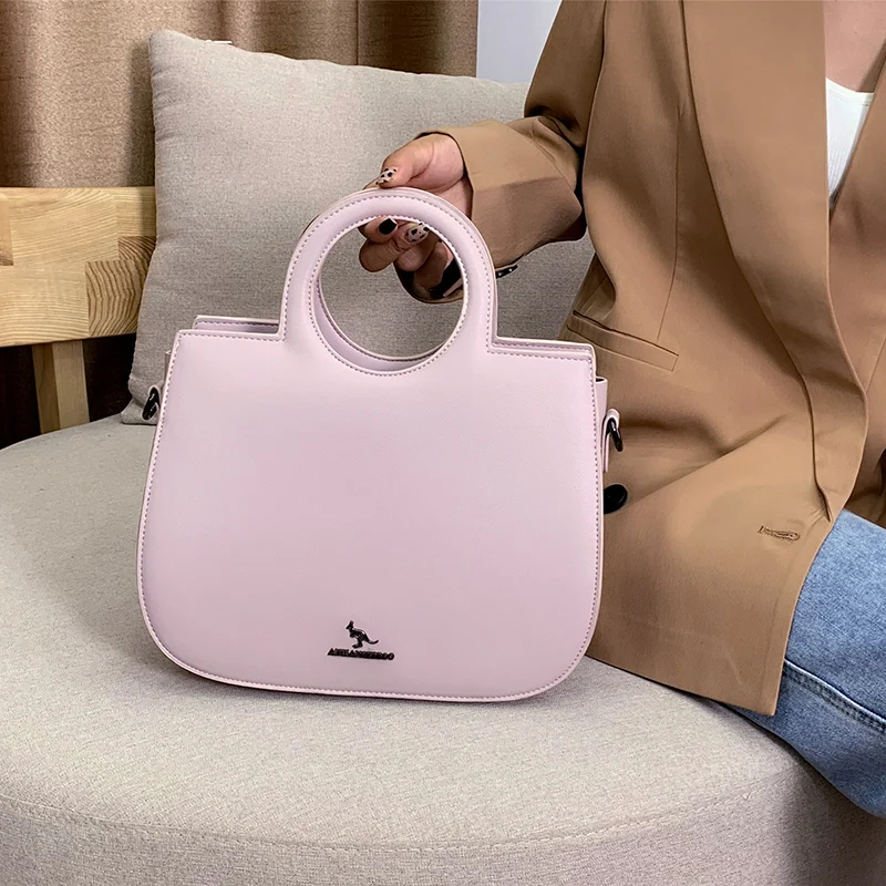 

Элегантная минималистичная классическая сумка для подгузников для женщин: роскошная кожаная сумка через плечо, винтажная модная дизайнерская сумка-тоут.