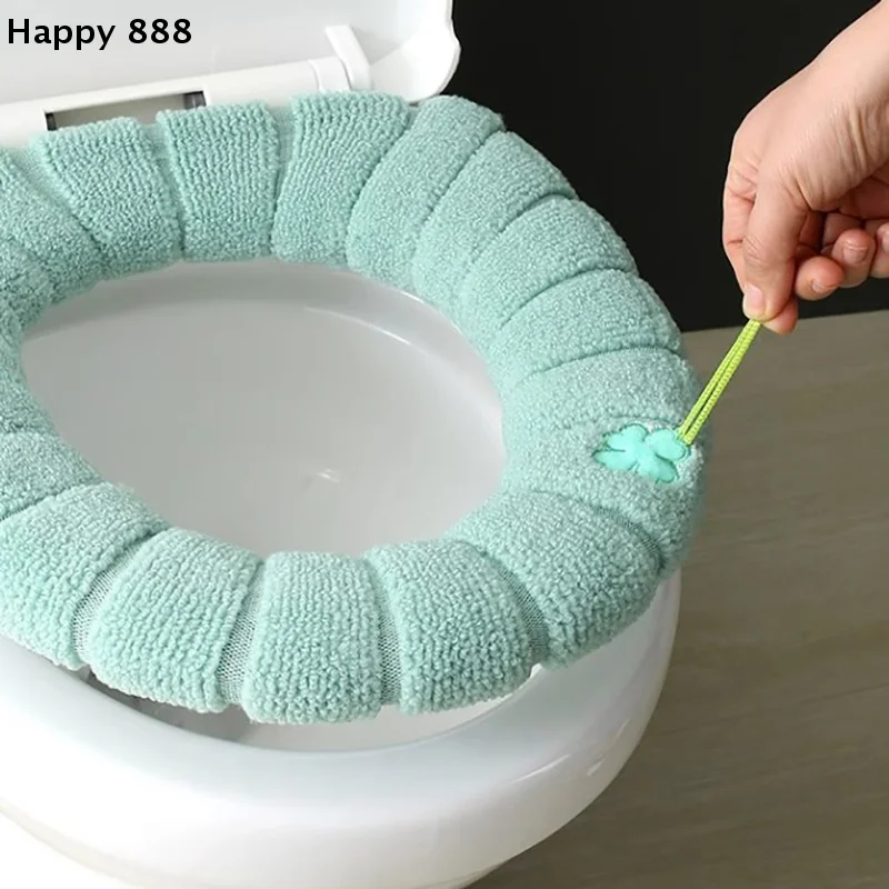 Verdickter, waschbarer und abnehmbarer Winter-Toilettensitz mit Klappgriff für den Badezimmergebrauch: Ein warmes und weiches unverzichtbares Haushaltszubehör.