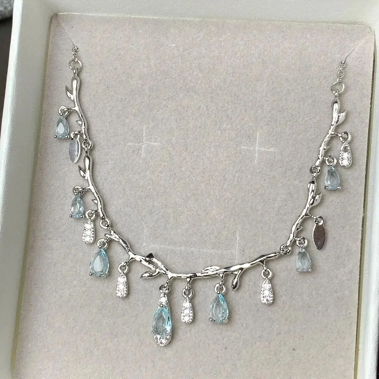 

Unique design Blue Crystal Pendant Tassel Twig Shape Necklace Silver Material 5A Zircon Women Daily & Party Date Wear Jewelry