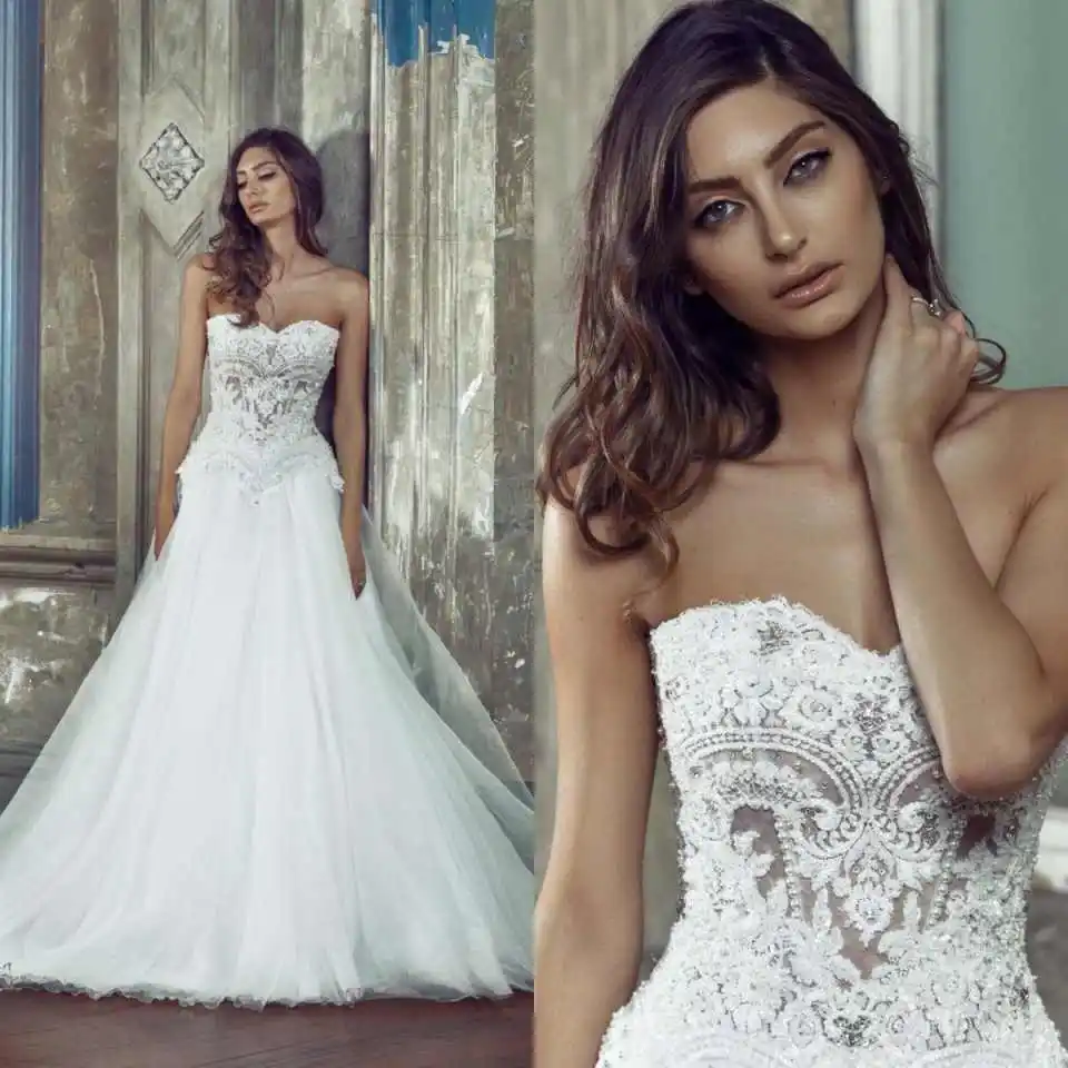 

Exquisite Wedding Dresses A Line Tulle Tiered Bridal Gowns Lace Appliques Sleeveless Backless Robes Customized Exquisite D261250