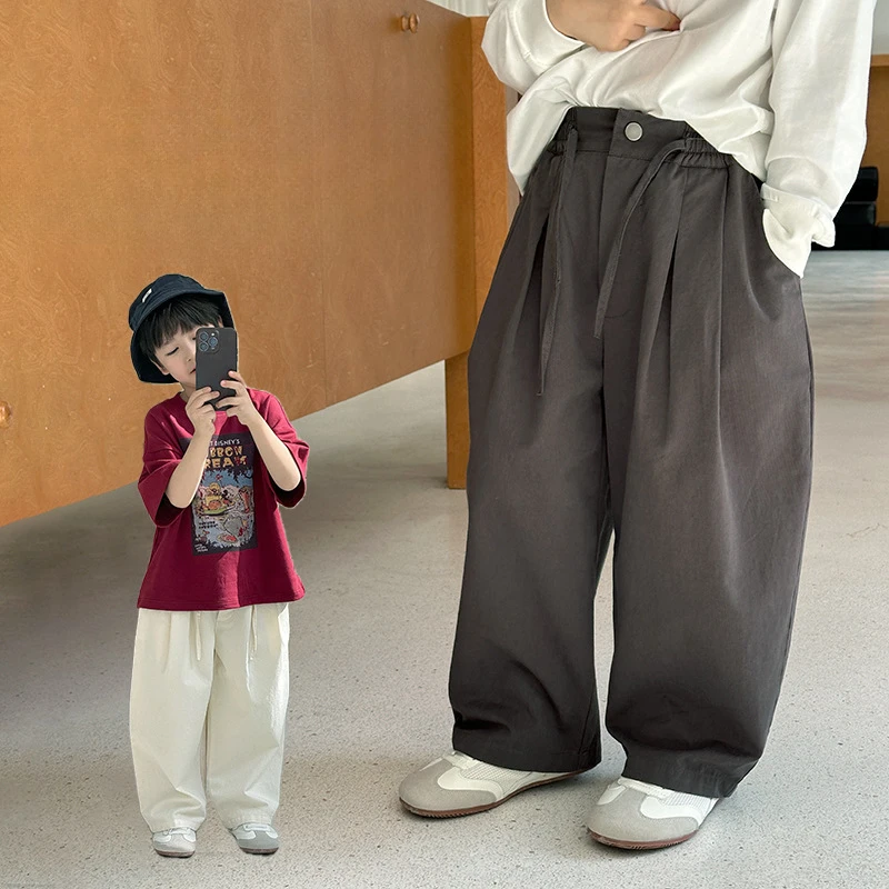 2026 Children's Twill Cotton Loose Casual Men Women Mid Size Children's Western-style Lace Up Solid Color Carrot Pants Trend