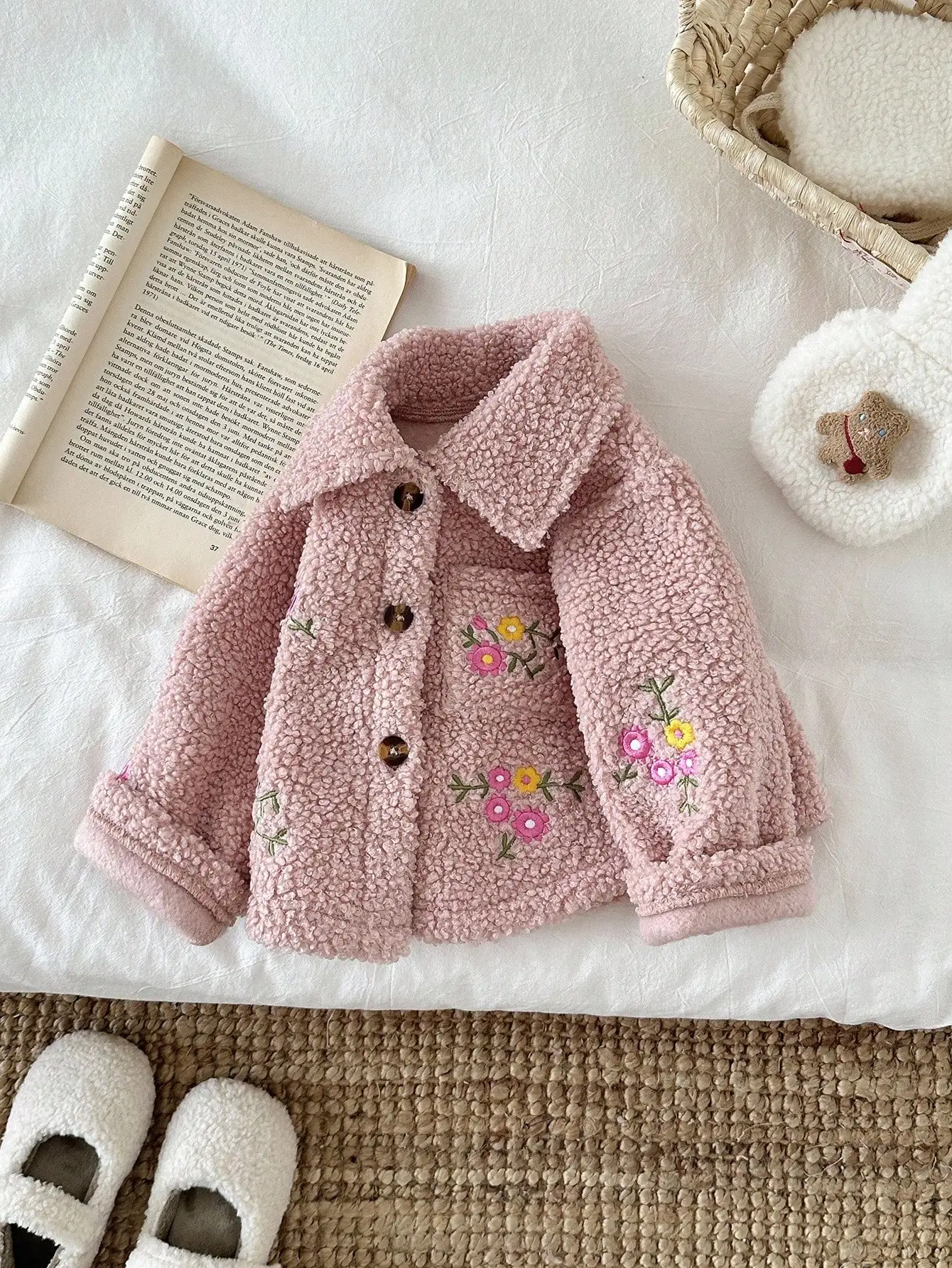 Baby girl's fall/winter plush teddy coat with small flower embroidery and single button closure