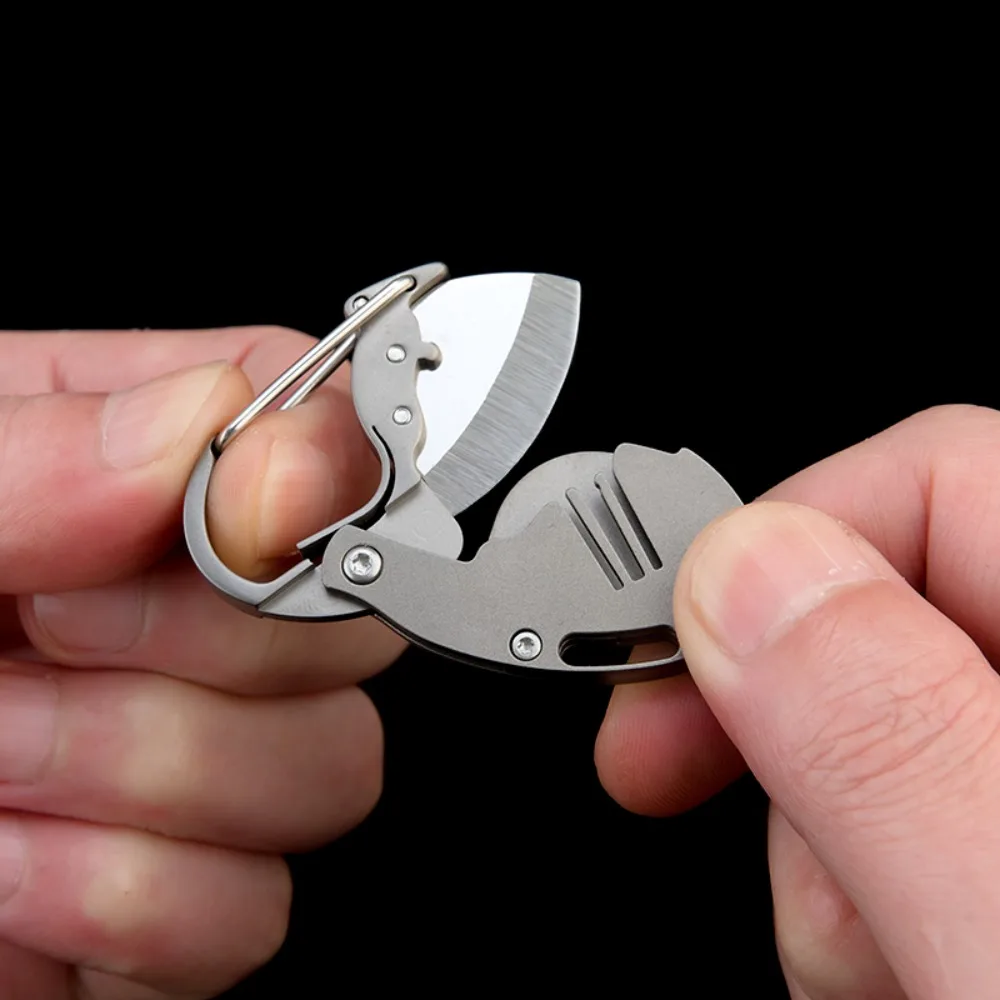 Cuchillo táctico plegable compacto de aleación de titanio - imagen 5