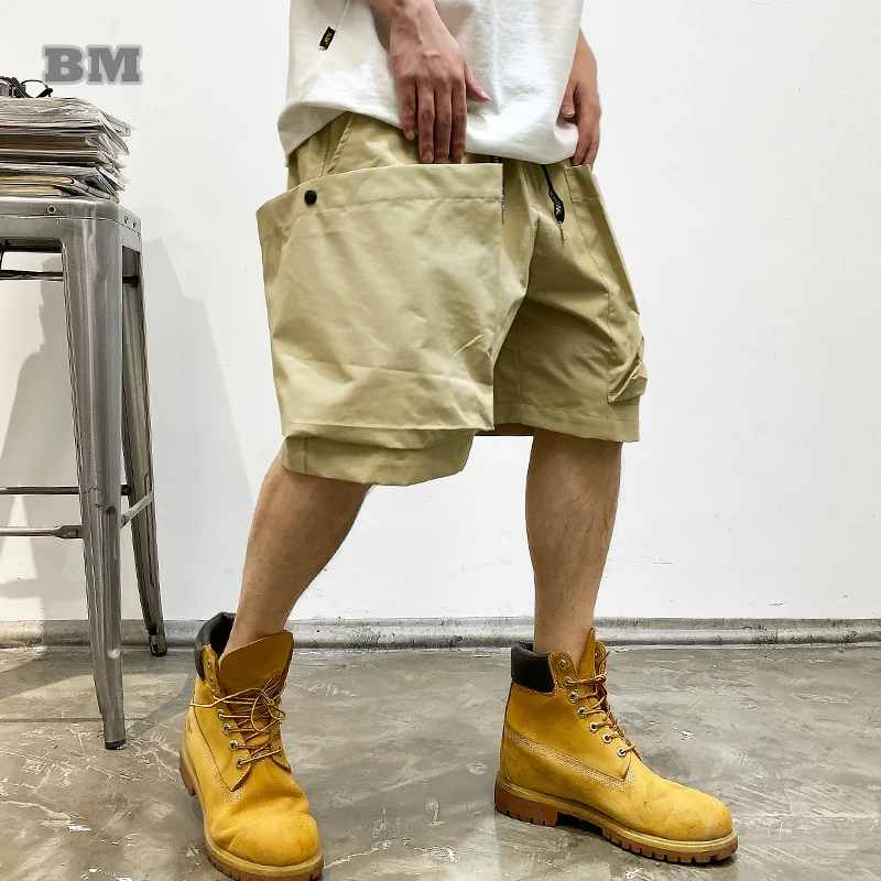 Letnie koreańskie modne duża kieszeń szorty Cargo męskie ubrania japońska moda uliczna wysokiej jakości nylonowe spodnie luźne w stylu Casual