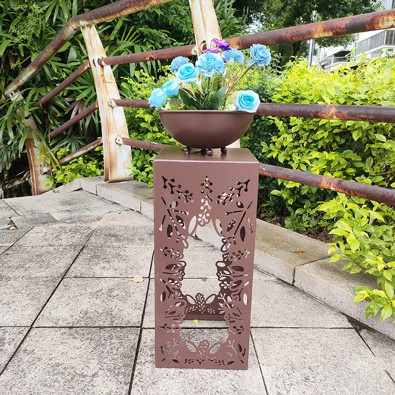 Modern raised chocolate iron hollow eco-friendly flower pot, suitable for home and outdoor garden use