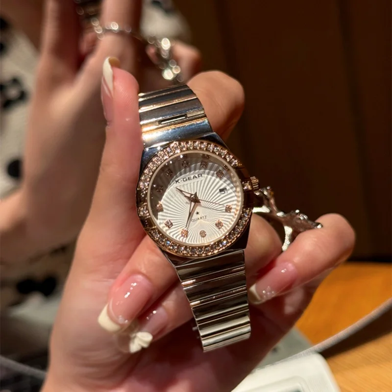 

Женские наручные часы с уникальным темпераментом, легкий роскошный стальной ремешок, изысканные и универсальные, с календарем, кварцевые часы.