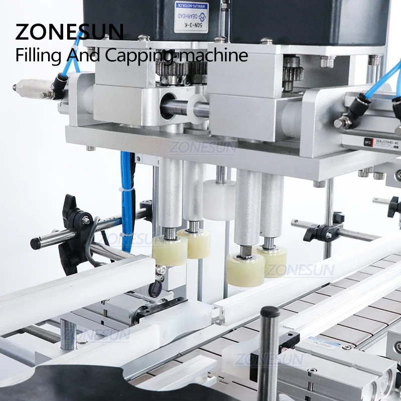 ZONESUN ماكينة تعبئة وتغطية العطور السائلة ذات 4 رؤوس أوتوماتيكية مع وحدة تغذية الغطاء لخط الإنتاج