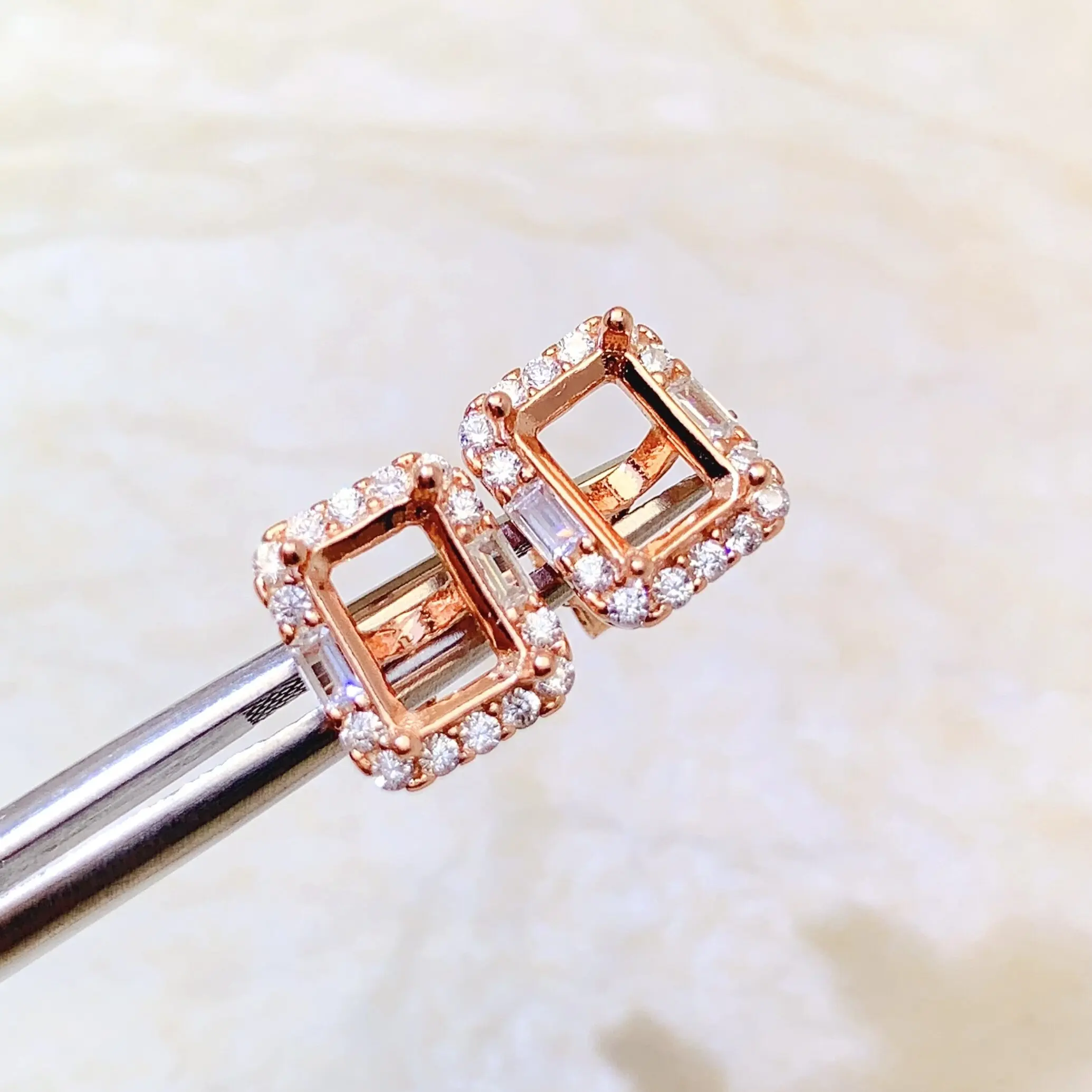 49 S925 sterling silver ear studs with a rectangular base, 5*7mm, simple design with surrounding diamonds, and an empty base