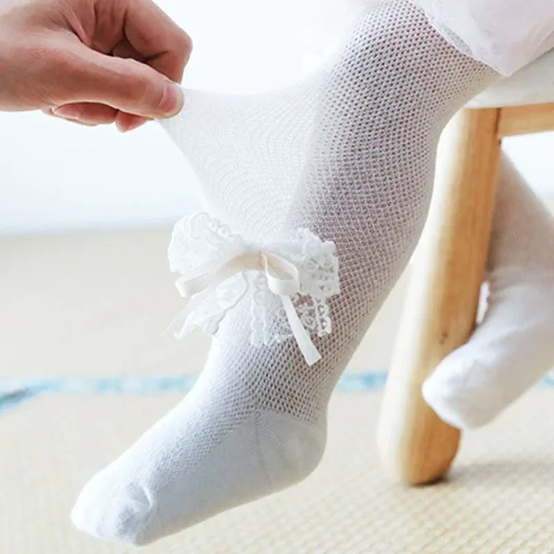 Collants en dentelle et maille pour petite fille, bas mignons avec nœud et fleur pour nouveau-né