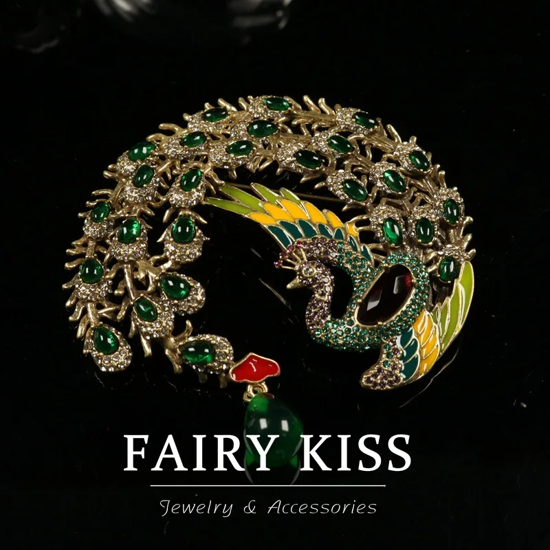 

Винтажная легкая роскошная брошь в Европе и Америке, украшенная глазурованной модной элегантной ювелирной булавкой в форме перьев павлина для женщин