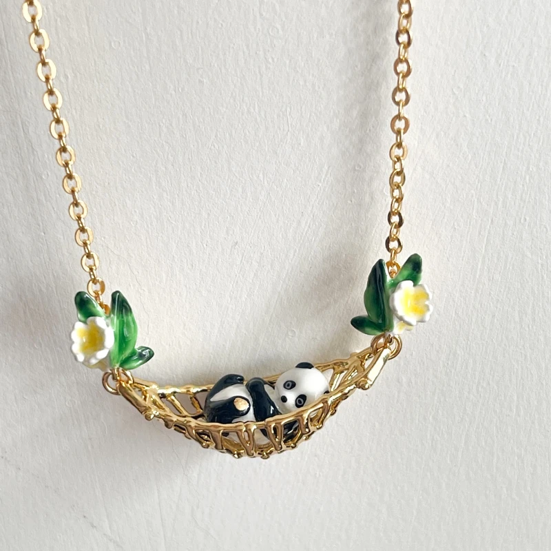 

Y Hand drawn enamel cute fairy tale bamboo leaf flower cradle panda necklace
