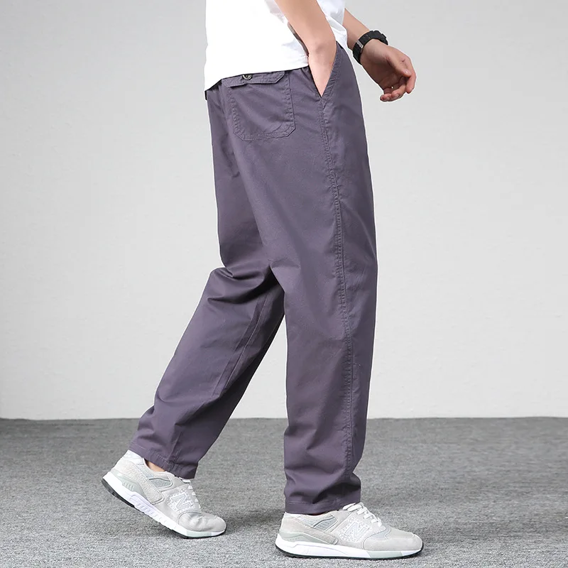 2025 Primavera Nuovi Uomini di Modo Allentato Casual Alla Moda di Colore Solido Dritto Gamba Larga Elastico In Vita Pantaloni Cargo Pantaloni Maschili Vestiti