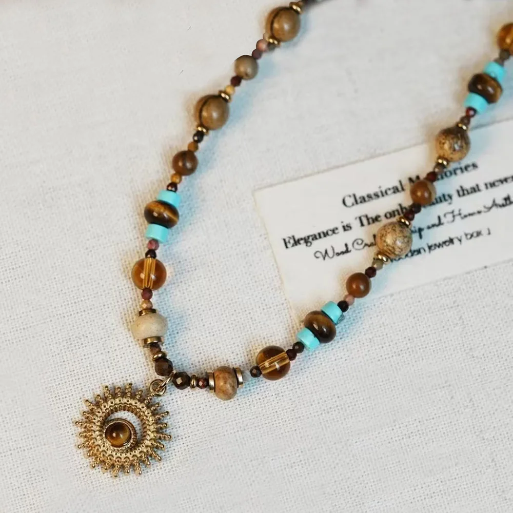 light luxury niche tiger eyes turquoise natural stone necklace titanium steel accessory Sun pendant suitable for travel Gift