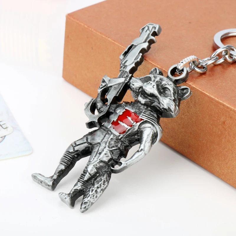 Catoon Animal Raccoon Pendant Keychain Movie Theme Raccoon Holding Gun Shape Metal Alloy Keyring Jewelry Cosplay Props Gift