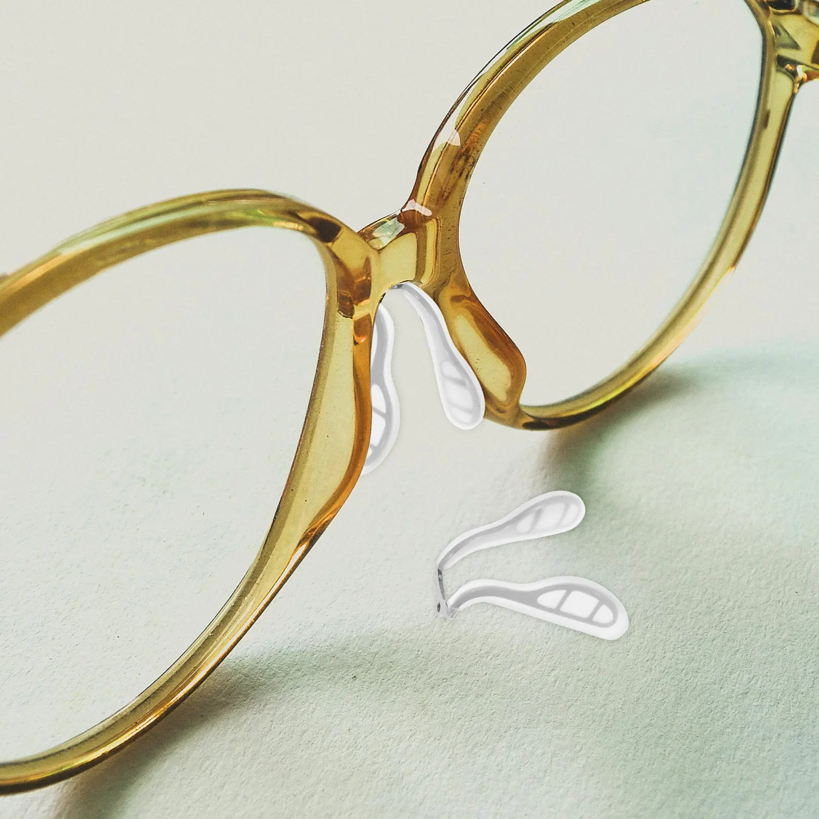 

2 шт. — Силиконовые накладки на носоупоры для очков, металлические, с покрытием, в форме восьмерки, противоскользящие, комфортные, для надежной фиксации