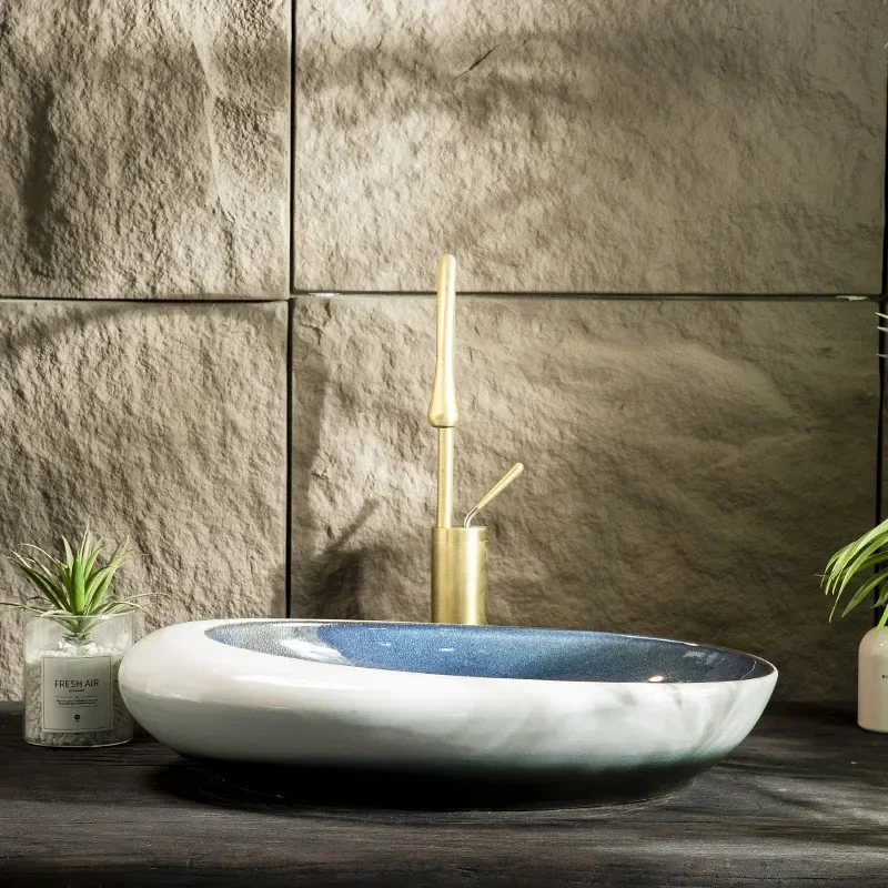 Lavabo da palcoscenico in ceramica artistica e creativa, lavandino del bagno, moda retrò del bagno di casa, nuovo cortile della decorazione della casa