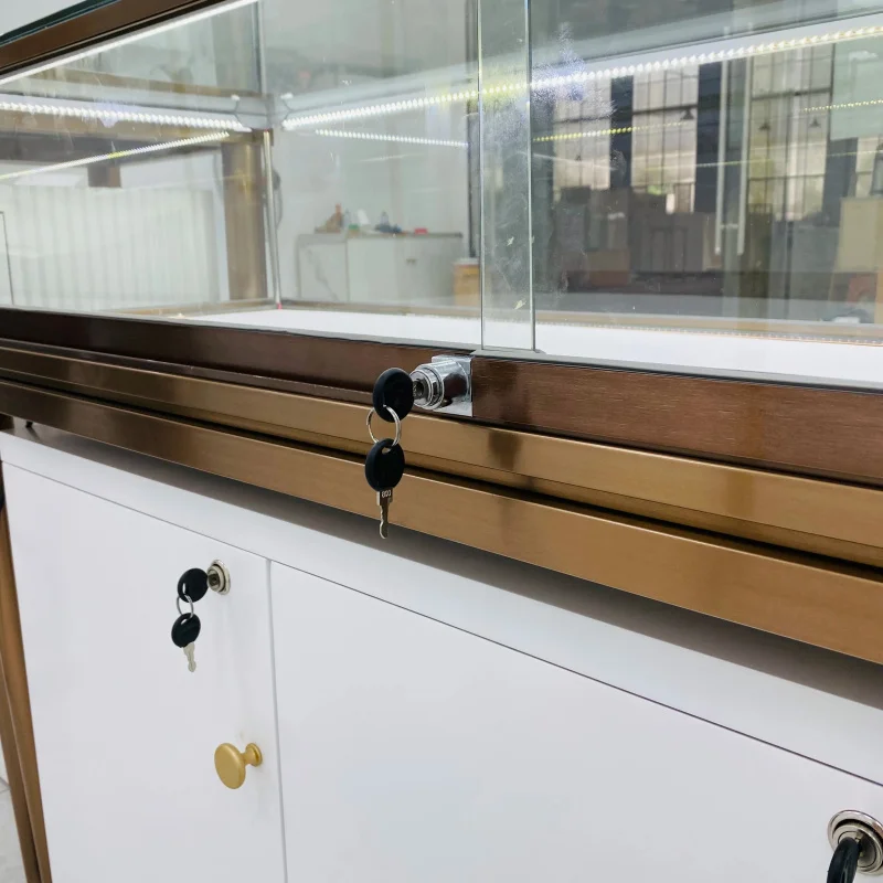 custom.Tempered Glass Stainless Steel Plated Frame LED Light Jewelry Counter Wave White Lacquer Storage Luxury Shopping