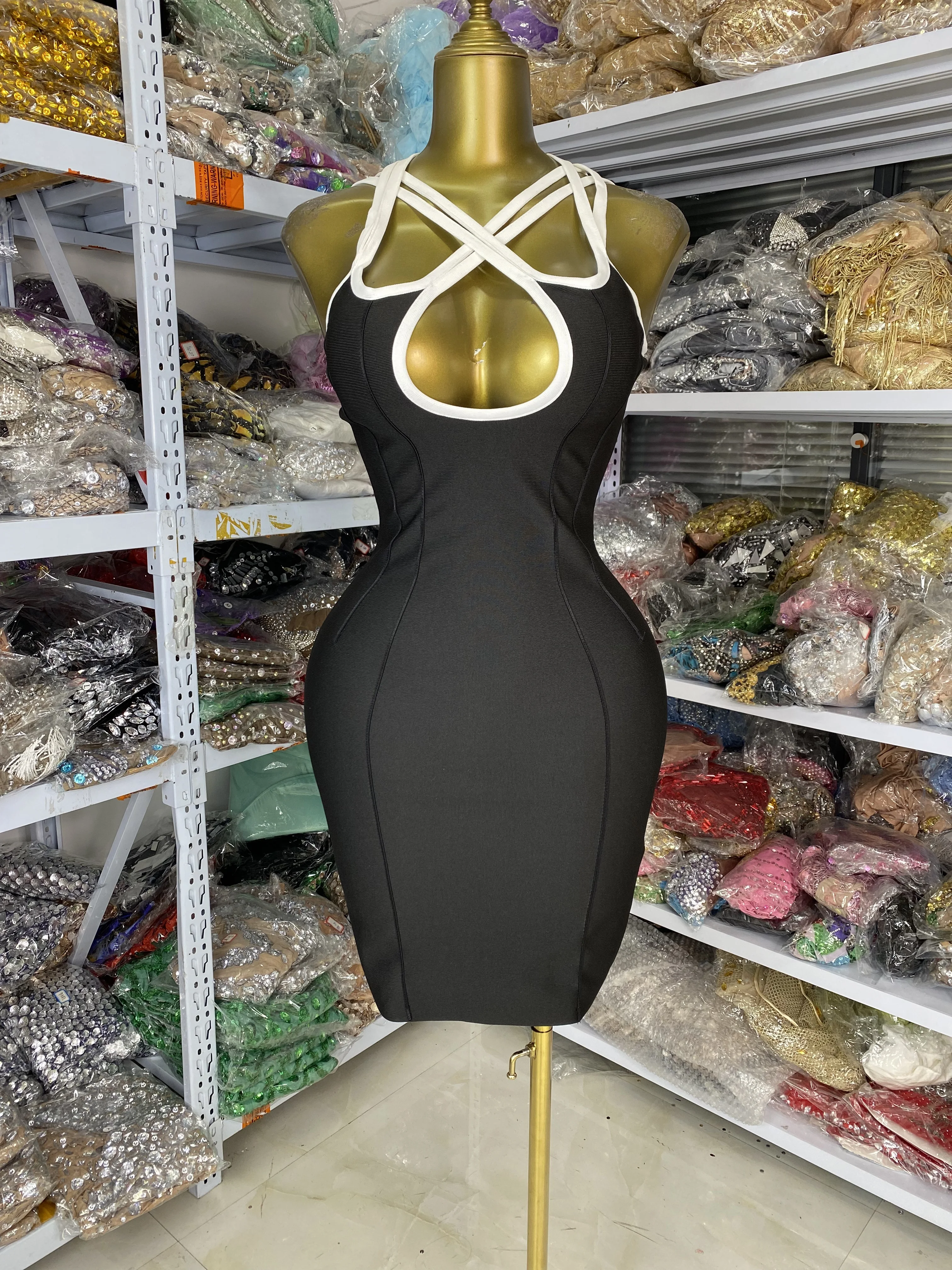Usine en gros femmes nouvelle robe de pansement noire col croisé moulante Mini élastique tricoté haute rue soirée Club robe de soirée