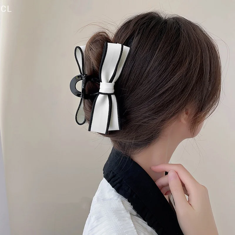 

French Chic Leather Bowknot Shark Hair Clips For Girls; Trendy Black and White Striped Hair Claws and Ponytail Holders.